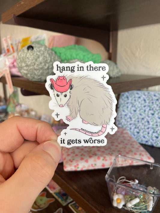 It Gets Worse Cowboy Opossum Sticker